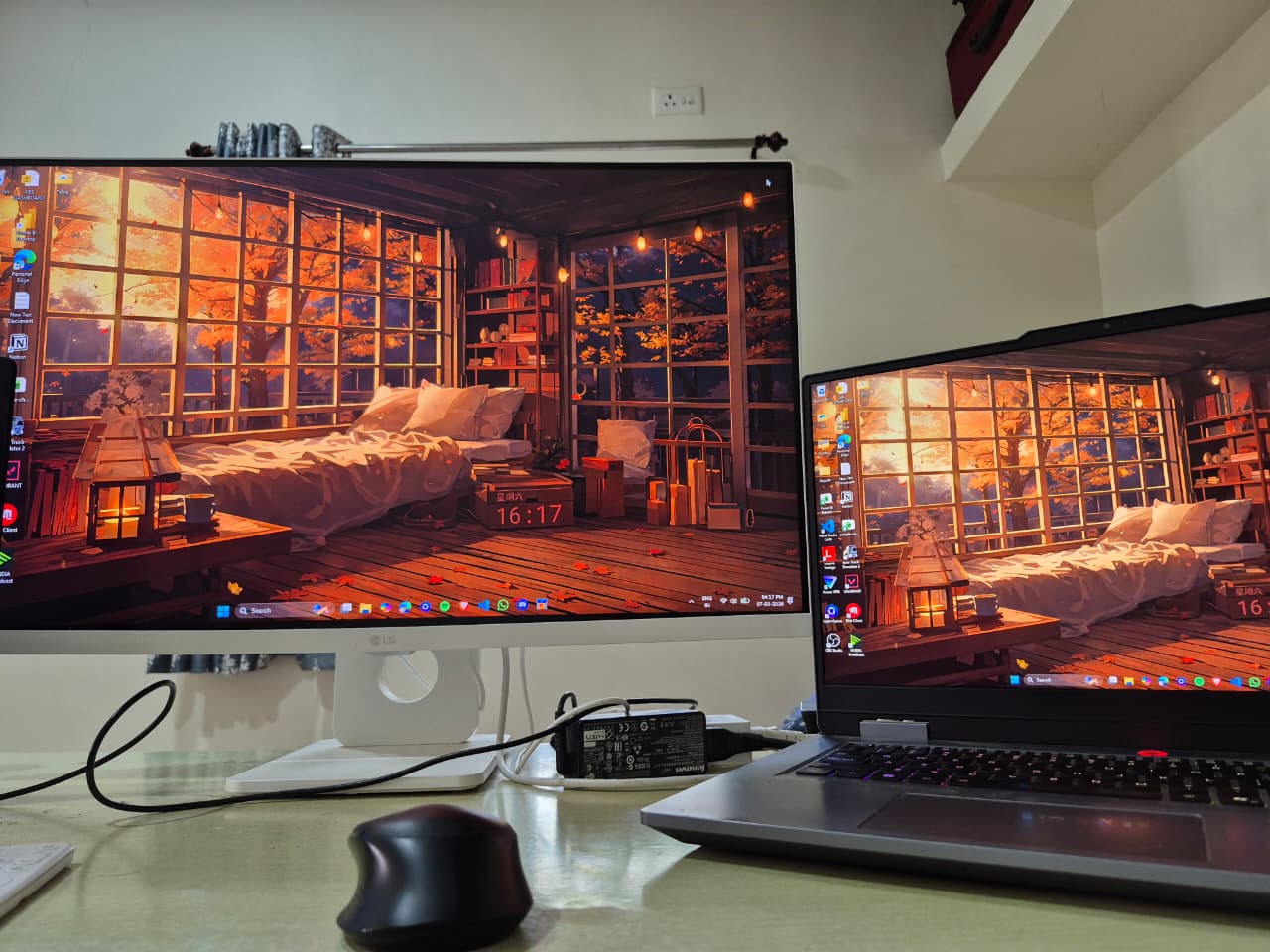 Kshitij's dual monitor desk setup with laptop and external display